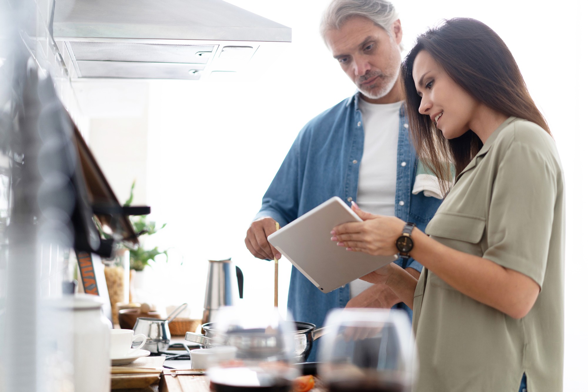 Consultation in kitchen with notes